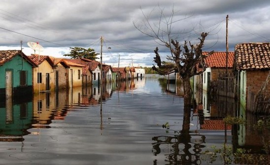 Evacuated homes are seen in flooded Longa river in Piaui