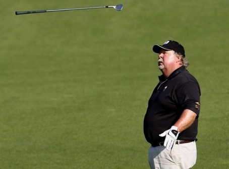 Former Masters champion Stadler flips his club after chipping to the second green during the 2009 Masters golf tournament in Augusta