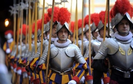 New recruits of the Vatican’s elite Swiss Guard march at the end of their swearing in ceremony at Saint Peter’s Square at the Vatican